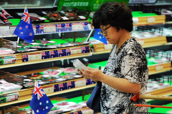 <p>Chinese woman purchasing Australian imported food products</p>